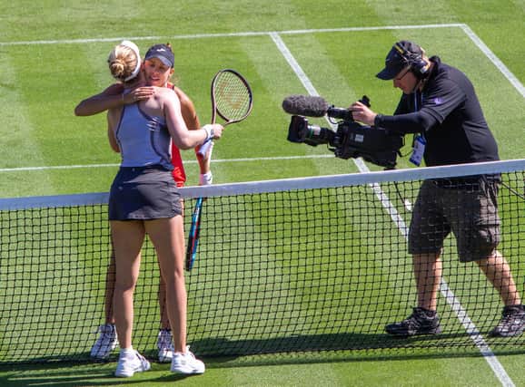 Barry Davis sent us this shot of  Magda Linette of Poland and Alison Riske of the US at the Eastbourne International women's tennis on Tuesday June 21. It was taken with a  Canon 100d