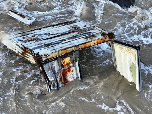 Authorities responded to a shipping container, that washed ashore at Elmer, on Monday (January 12).