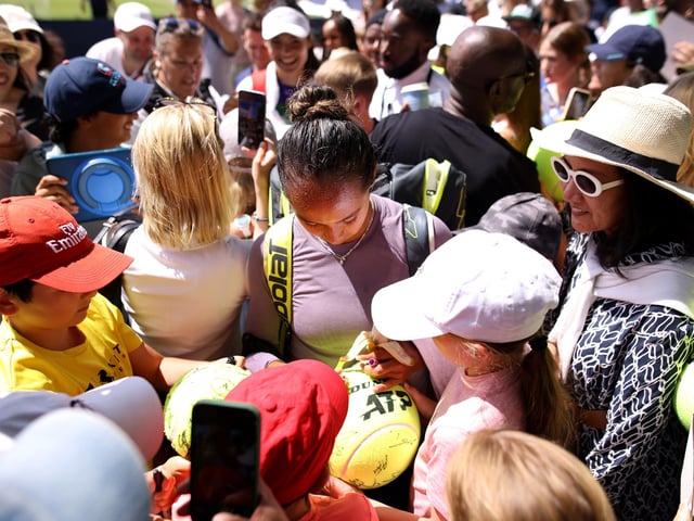 Leylah Fernandez of Canada signs fans autographs after a practice session on day two of the Rothesay International Eastbourne at Devonshire Park (Photo by Charlie Crowhurst/Getty Images for LTA)