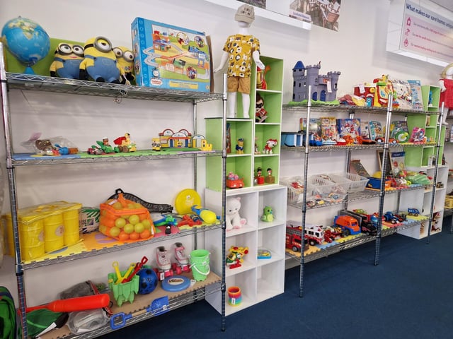 Inside Guild Care's new shop dedicated to children's toys, clothes and equipment, as influencer Jen Graham, known as Charity Shop Girl cuts the ribbon to officially open the Portland Road store
