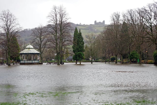 Riber Castle looks down on a flooded Hall Leys Park at Matlock this morning.