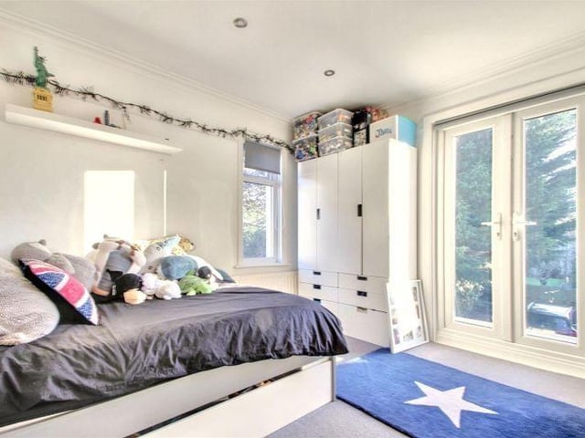 There are five first-floor bedrooms, with an en suite and dressing room to the double-aspect master bedroom