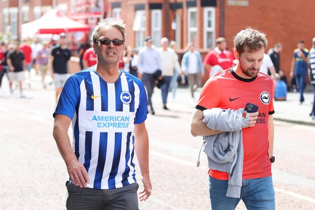 MANCHESTER, ENGLAND - AUGUST 07: Brighton & Hove Albion fans arrive at the stadium prior to the Premier League match between Manchester United and Brighton & Hove Albion at Old Trafford on August 07, 2022 in Manchester, England. (Photo by Catherine Ivill/Getty Images)