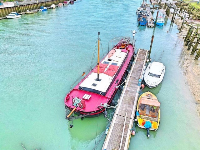 This stunning seafaring Dutch barge houseboat on a private mooring on the River Arun has come on the market with Michael Jones Estate Agents with a guide price of £275,000
