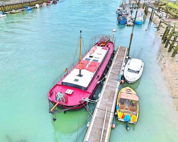 This stunning seafaring Dutch barge houseboat on a private mooring on the River Arun has come on the market with Michael Jones Estate Agents with a guide price of £275,000