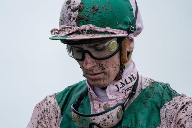 CHICHESTER, ENGLAND - AUGUST 02: A muddy Hector Crouch returns on a wet and muddy day at Goodwood Racecourse on August 02, 2023 in Chichester, England. (Photo by Alan Crowhurst/Getty Images):Images from a murky second day at Glorious Goodwood by Alan Crowhurst of Getty and Clive Bennett