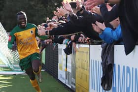Daniel Ajakaiye celebrates with fans after putting Horsham ahead against Dorking | Picture: Natalie Mayhew / ButterflyFootball
