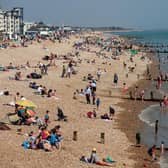 Beachgoers play and relax on the beach during the warm weather on bank holiday Monday on May 7, 2018 in Bognor Regis. Picture by Jack Taylor/Getty Images