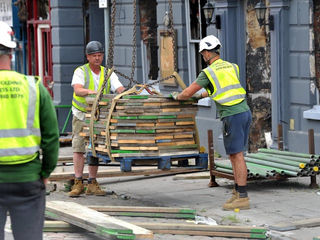 Scaffolding work has started on the Angel Inn in Midhurst. Pic S Robards SR2305311