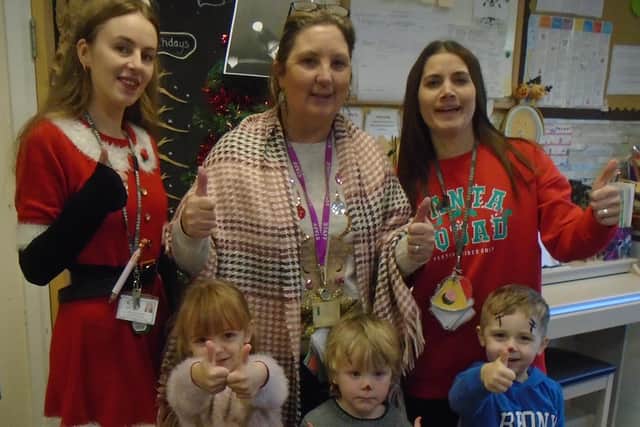 West Rise staff (L-R: Chelsea Stonestreet, Caroline Croft and Hayley Boddy) with some children from the nursery (photo from West Rise)