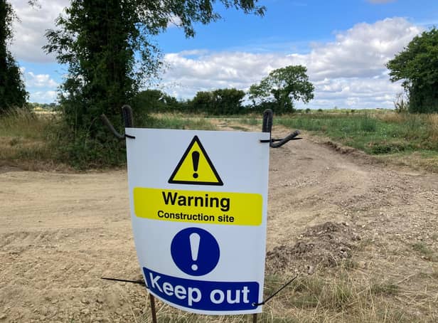 A sign has appeared in a Tangmere field