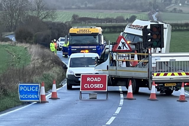 Photos taken on A280 Long Furlong show the road has been closed whilst emergency services work at the scene