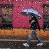 Heavy rain across Sussex is expected to give way to brighter conditions. (Photo by LUIS ROBAYO/AFP via Getty Images)