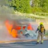 Firefighters rushed to the M23, near Horley, after a vehicle burst into flames. Photo: Sussex News and Pictures