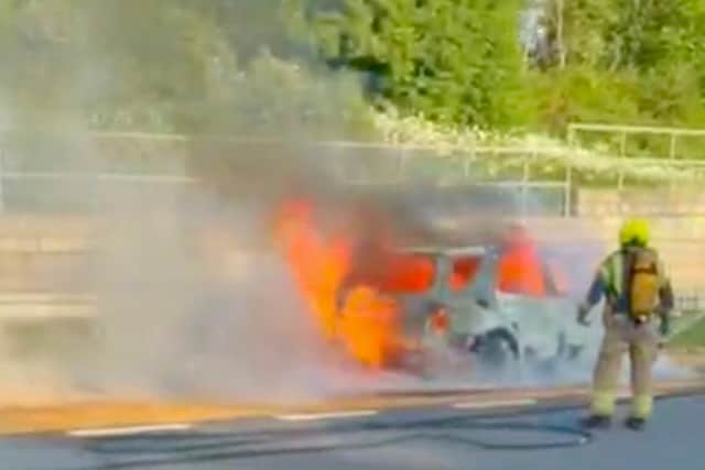 Firefighters rushed to the M23, near Horley, after a vehicle burst into flames. Photo: Sussex News and Pictures