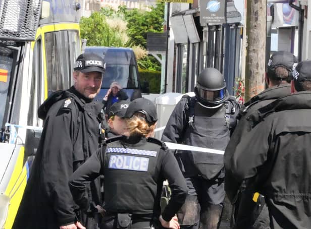 A Royal Navy Explosive Ordnance Disposal Team assisted Sussex Police in Tarring Road. Photo: Eddie Mitchell