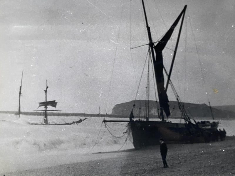 The ketch rigged barge ‘Jachin’ (on the beach) and behind her, the brigantine ‘Katherine’, both run ashore in Seaford Bay, 1914. Newhaven’s ‘Sir Fitzroy Clayton’ attended and rescued both crews from the vessels. The ‘Jachin’ was salvaged and went on in service and later as a private boat until 1950.