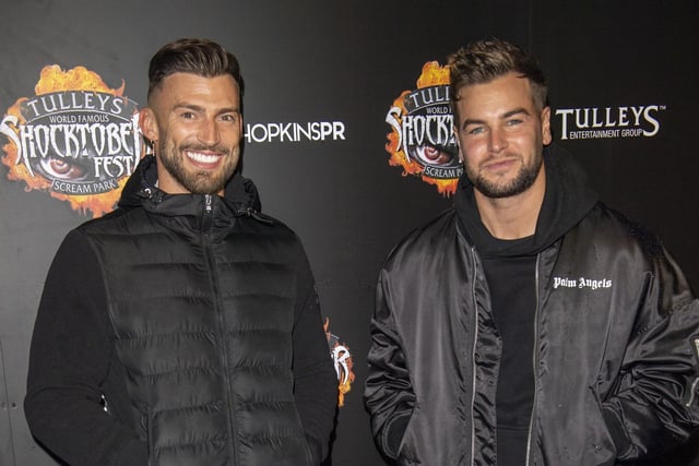 Chris Hughes (L) and Jake Quickenden (R) attend Tulleys Shocktober Fest at Tulleys Farm on September 30, 2022 in Crawley, England. (Photo by Stuart C. Wilson/Stuart Wilson/Getty Images for Tulleys Shocktober Fest):