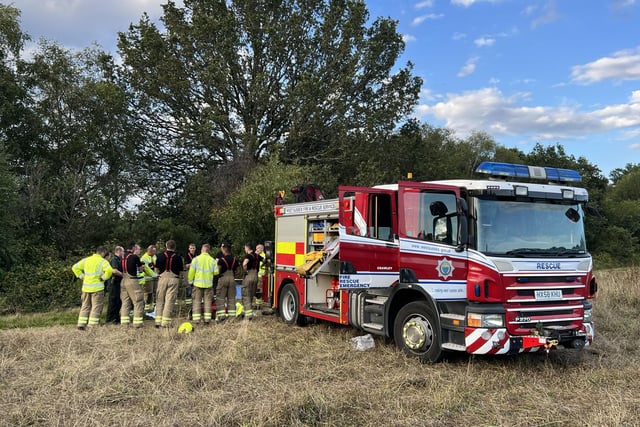 Firefighters used a rope system to lift the man to safety after he fell into a well in a Horsham field. Photo: Eddie Mitchell