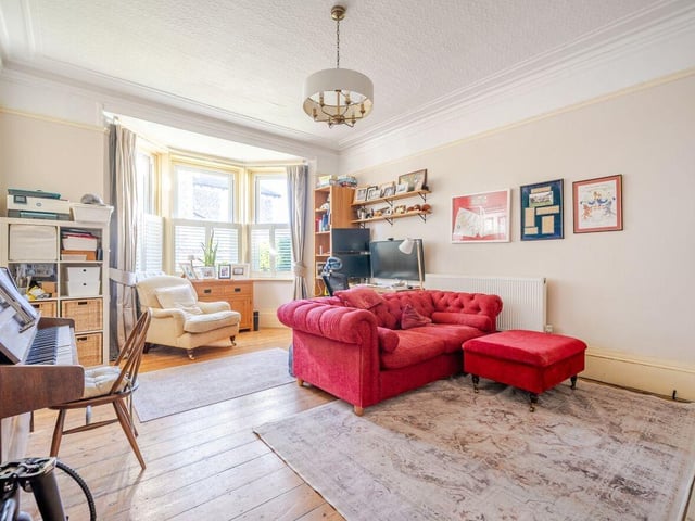 The bay-fronted study has a fireplace and wood burner