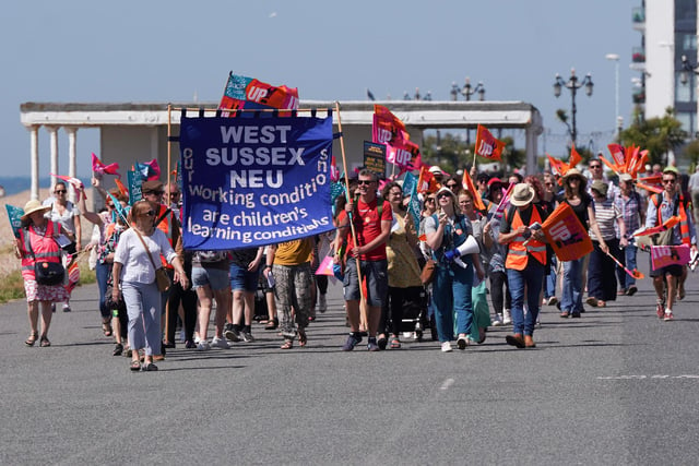 Striking NEU members and supporters marched along the prom in Worthing
