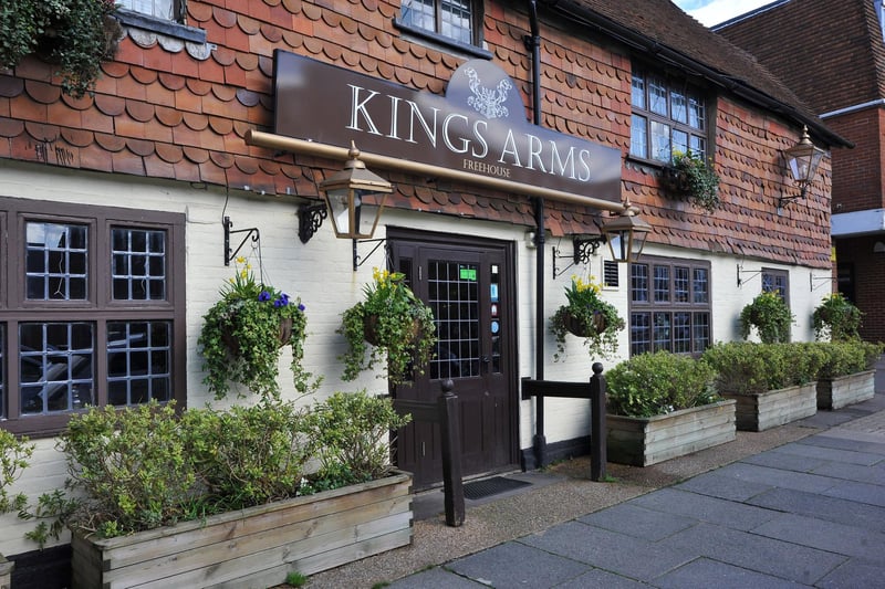 The King's Arms, Bishopric, Horsham: "This 18th century coaching inn in the town centre was the King and Barnes brewery tap ... A comfortable two-bar pub now operated by North and South Leisure Ltd, it has five handpumps serving mainly local ales, and two keg lines. Food is served including quality Sunday roasts. Live music plays every Friday and there are Monday quiz nights and an open mic on alternate Thursdays."