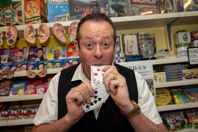 Card magician Roy Charles in the store as U-Need-Us celebrated its 95th anniversary in 2018. Picture: Vernon Nash (180396-008)