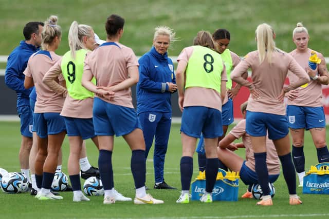 Sarina Wiegman, Head Coach of England, speaks to the players during a drinks break during an England Training Session at St Georges Park (Photo by Michael Regan/Getty Images)