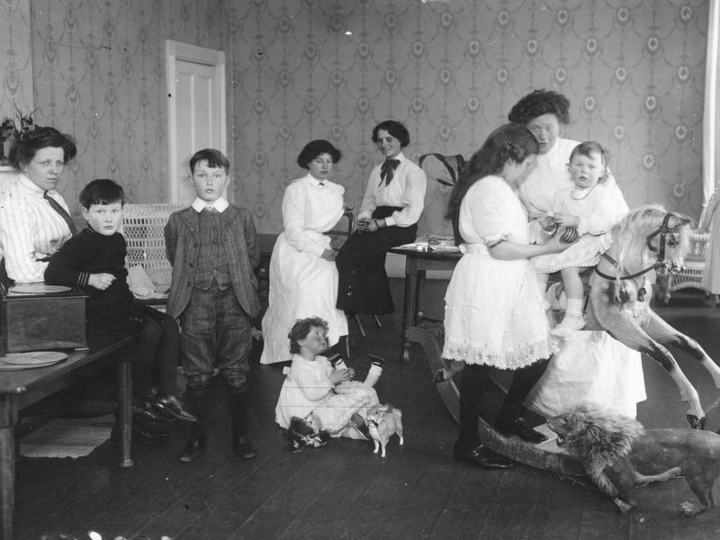 Middle-class children play with their toys, at a hotel for children at Bognor, in March 1913.