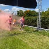 Over 700 people took part in a colourful ‘Rainbow Run’ in East Sussex to help raise money for St Wilfrid’s Hospice.