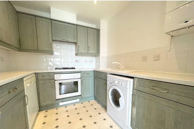 The apartment's fitted kitchen, with a good range of units and appliances