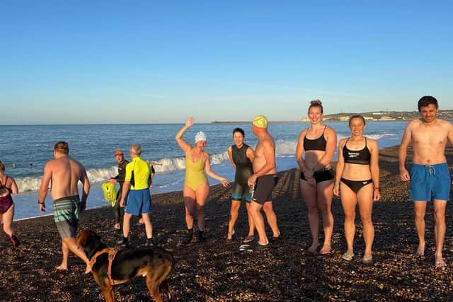 Seaford swimming group raise more than £2,500 for Newhaven Lifeboat. Photo: Andy Cook, John Simcock and Emmeline