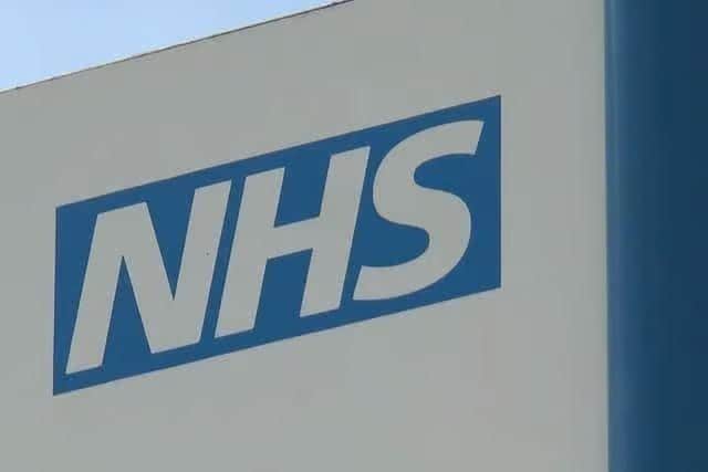 NHS logo.