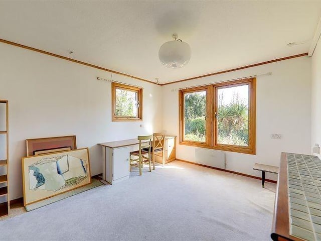 This reception room could be used as a ground-floor bedroom