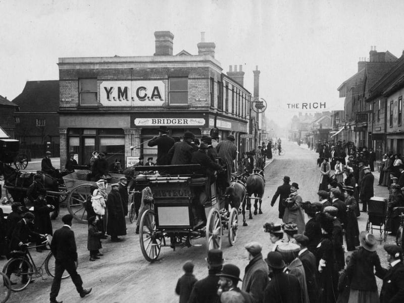 The Vanderbilt coach 'Meteor' drives past the YMCA in Crawley on its first voyage to Brighton on 22nd April 1907.
