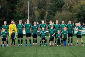 Burgess Hill Town line up with their mascots for a recent game | Picture by Lynden Humphrey