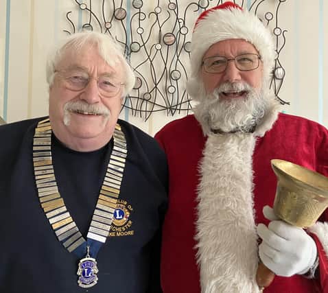 Santa and his friend Michael Moore, President of Chichester Lions Club