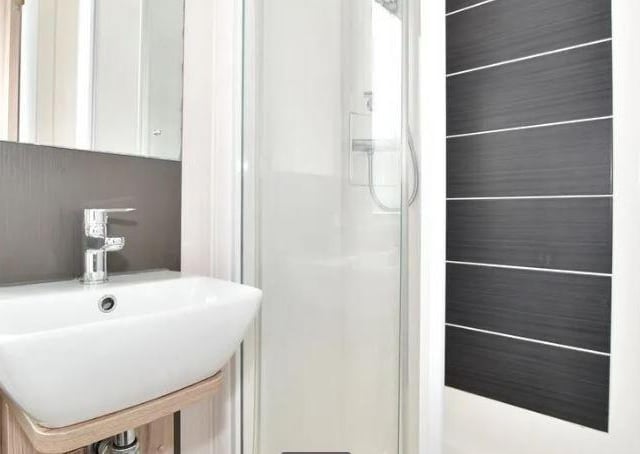 There are two shower rooms, one of which is ensuite