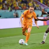 Teun Koopmeiners of Netherlands battles for possession with Brighton and Hove Albion midfielder Moises Caicedo of Ecuador during the FIFA World Cup Qatar 2022 Group A match