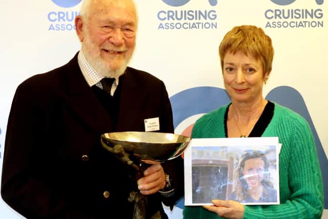 Sir Robin Knox-Johnston presenting the trophy to Fiona Slay, who received it on behalf of Jazz. Photo: Stuart Bradley / Cruising Association