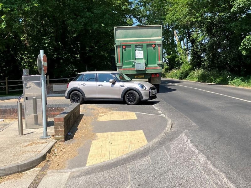 Residents say visibility is 'severely restricted' for motorists leaving the industrial estate. Photo: contributed