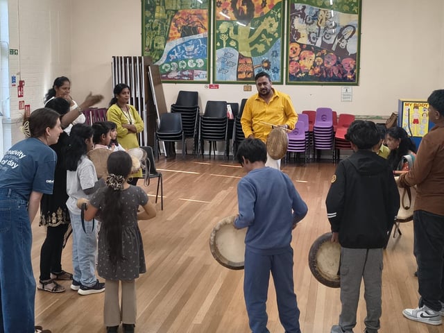Children and adults came together in Crawley to discover the powerful rhythms of Parai, a traditional Tamil drumming art form, at a community workshop organised by Aurvi Collective