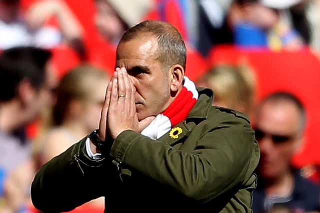 Swindon manager Paolo Di Canio appeals for divine help during his side's defeat to Spireites.
