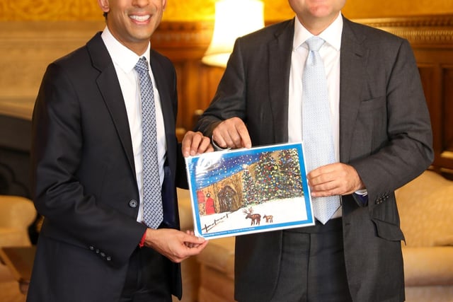MP Andrew Griffith with Prime Minister Rishi Sunak and Poppy’s winning design for the Christmas card.