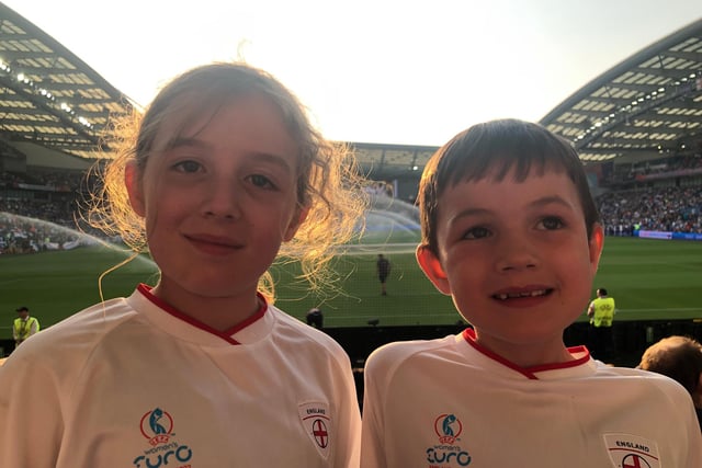 Young England fans cheer on the Lionesses