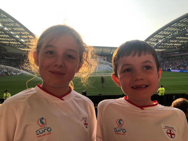 Young England fans cheer on the Lionesses