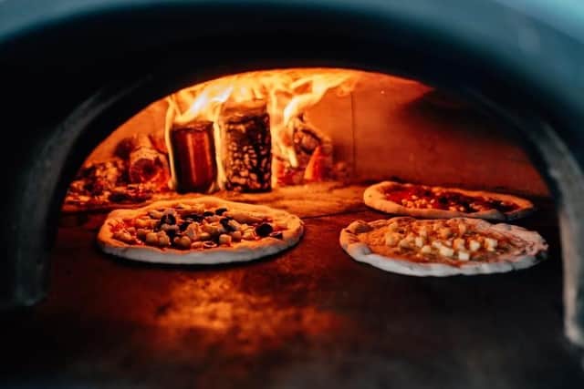 Pizzas in the oven at The Safari Pizza co, pizzeria and wine bar in Haywards Heath