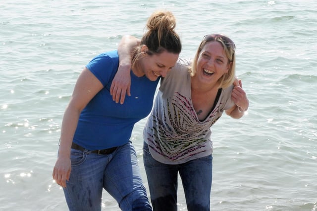 Debbie Pusey and Laura Cooke enjoying paddling in the sea in Bognor Regis