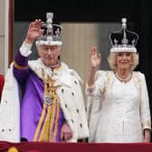 King Charles III and Queen Camilla on the balcony of Buckingham Palace following the coronation on May 6.  