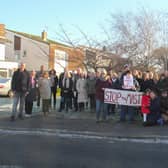 Residents came together to protest the planned mast.